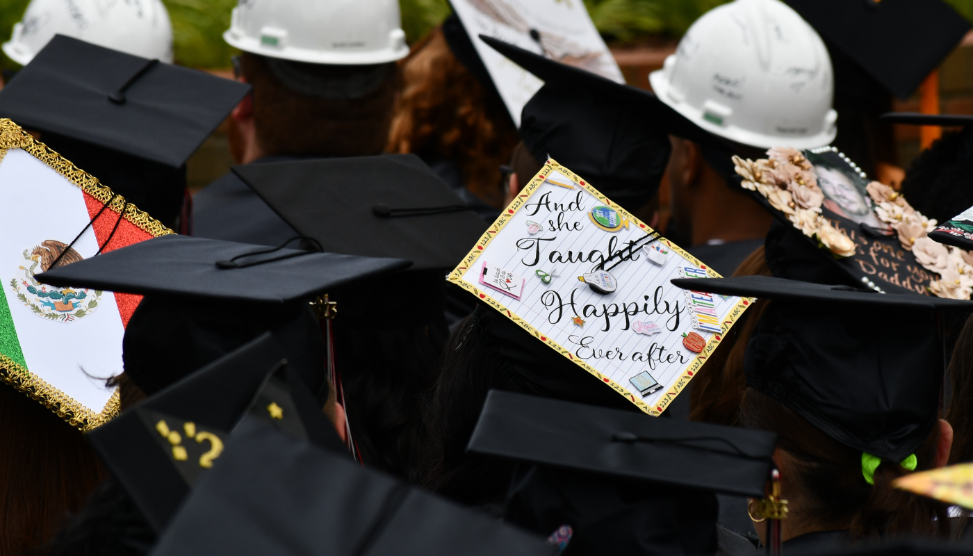 Pictured is a graduation hat that says, "And she taught happily ever after."